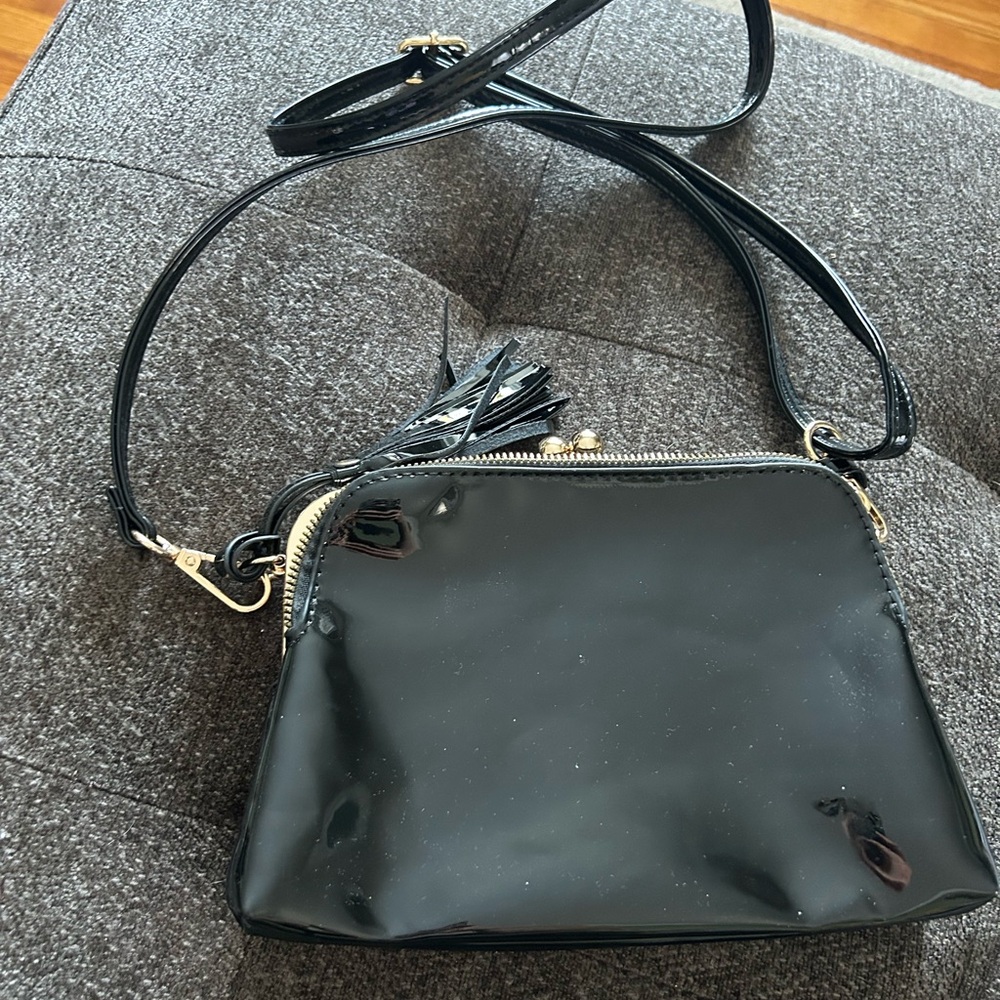 Black leather cross body, slightly used, tons of room